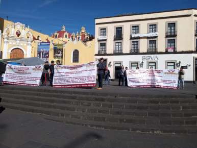 Exferrocarrileros bloquean el centro de Xalapa, exigen a AMLO cumpla con la justicia social prometida   