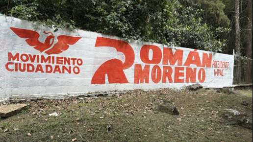 Propaganda de Román Moreno aparece en barda de escuela pública; se investiga el origen de la pinta